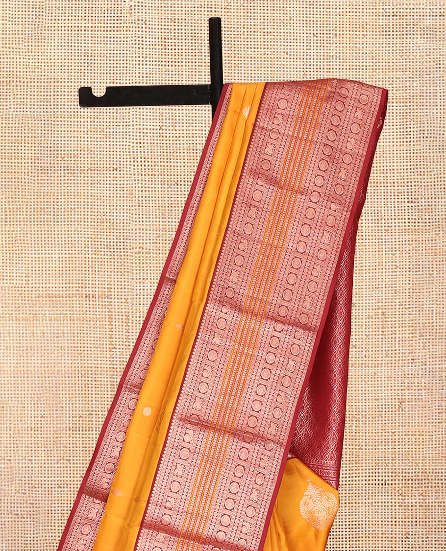 Yellow Vasundhara Silk Saree, Finely Crafted with Zari Buttas, Contrast Border of Thilakam Mokku, Muthu, Mayil, Chakram, Neli, and Kuthirai Designs, Jaal Pallu, and a Contrast Blouse