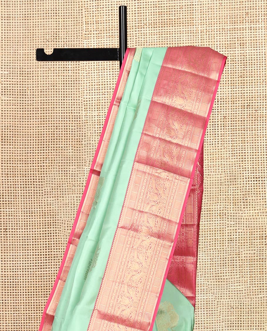 Green Vasundhara Silk Saree, Delicately Woven with Zari Buttas, Contrast Border of Thilakam, Kathir, Mayil Kann, Cross Kamalam, and Yaali Designs, Grand Pallu, and Contrast Blouse