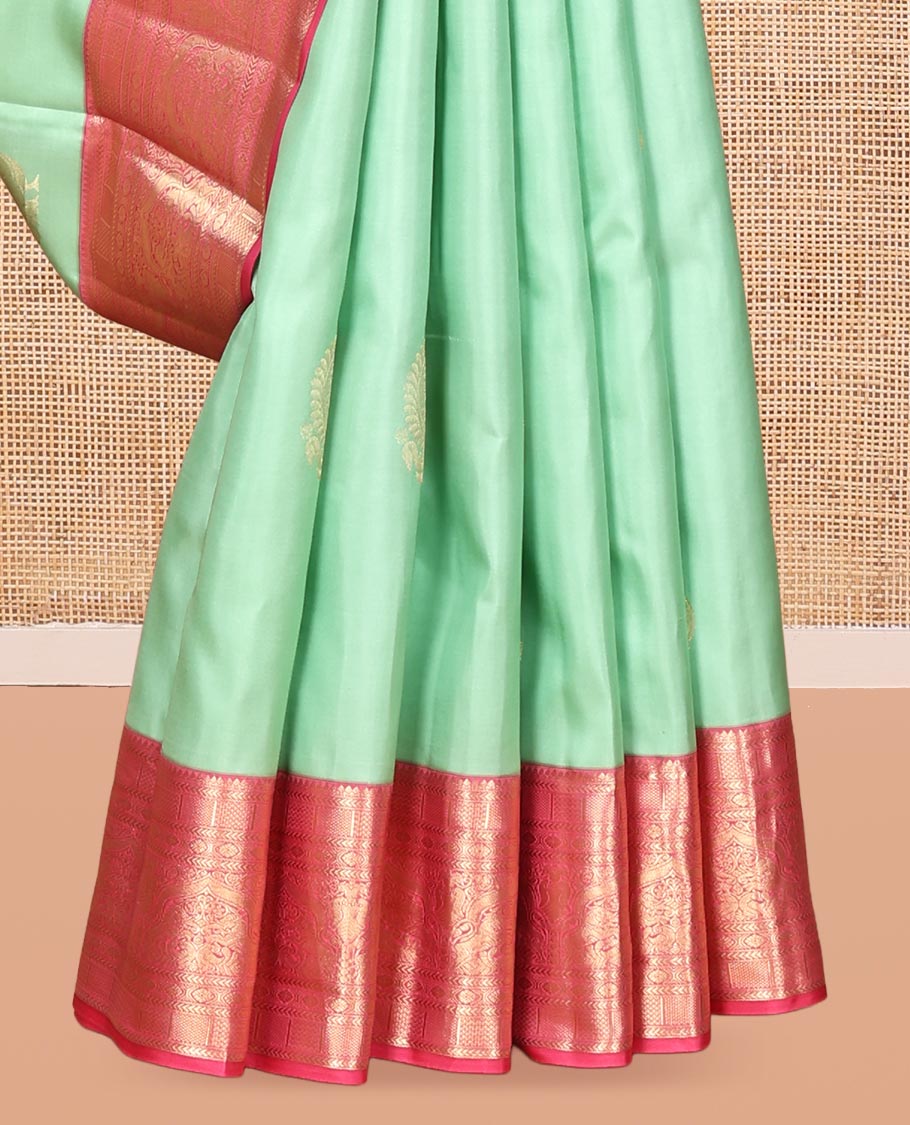 Green Vasundhara Silk Saree, Delicately Woven with Zari Buttas, Contrast Border of Thilakam, Kathir, Mayil Kann, Cross Kamalam, and Yaali Designs, Grand Pallu, and Contrast Blouse