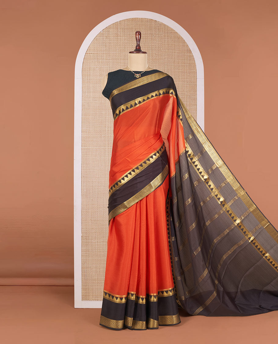 Rust Orange Plain Mysore Silk Saree, Gracefully Embellished with a Contrast Temple Border of Jaal Designs, Pallu Steeped with Zari Stripes, and Paired with a Contrast Blouse
