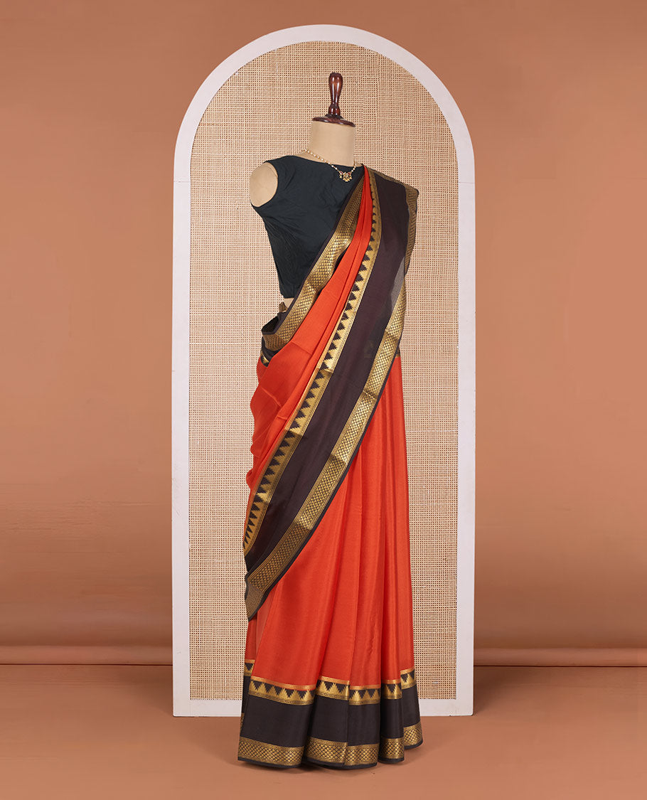 Rust Orange Plain Mysore Silk Saree, Gracefully Embellished with a Contrast Temple Border of Jaal Designs, Pallu Steeped with Zari Stripes, and Paired with a Contrast Blouse