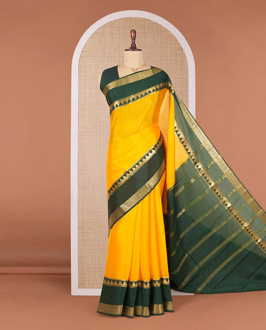 Orange Plain Mysore Silk Saree, Artfully Detailed with Contrast Temple Border of Jaal Designs, Pallu Steeped with Zari Stripes, and Paired with a Contrast Blouse