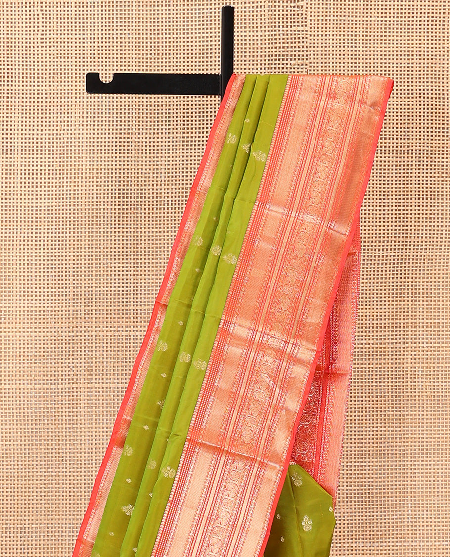 Green Vasundhara Lite Silk Mix Saree Accentuated with Zari Buttas, Complemented with a Contrast Border Featuring Manga, Muthu, Kamalam, Neli, Vanki, and Mayil Designs, a Grandly Zari-Decked-Up Pallu, and a Contrast Blouse