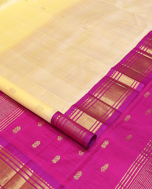 Yellow zari buttas Kanchipuram silk saree, contrast korvai one-sided border of rekku,banaras & jaal & zari design pallu