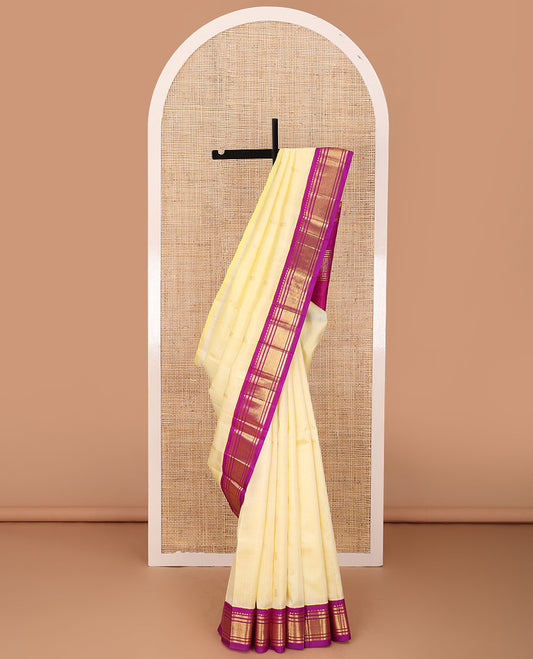 Yellow zari buttas Kanchipuram silk saree, contrast korvai one-sided border of rekku,banaras & jaal & zari design pallu