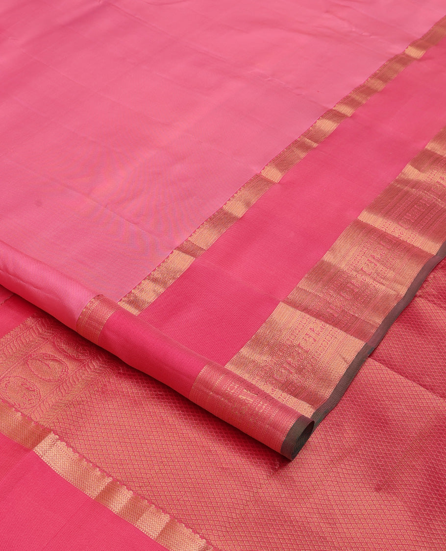 Pink plain Kanchipuram silk saree, contrast rettai pettu border of muthu, kathir, kuyil kann,rudraksham, mayil, and kuthirai designs, and mayil kann pallu