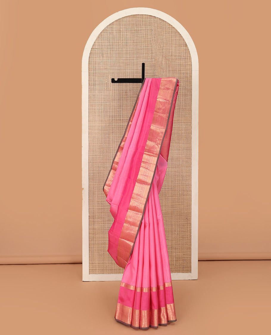 Pink plain Kanchipuram silk saree, contrast rettai pettu border of muthu, kathir, kuyil kann,rudraksham, mayil, and kuthirai designs, and mayil kann pallu