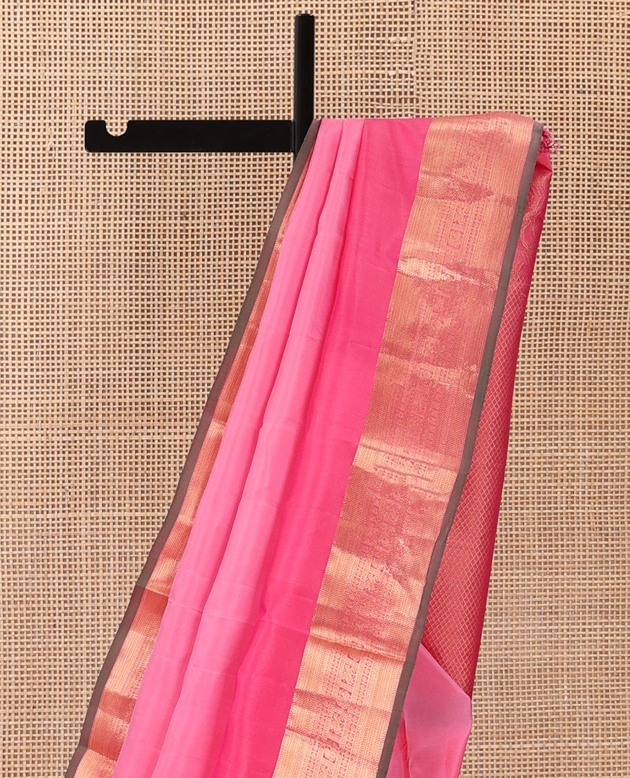 Pink plain Kanchipuram silk saree, contrast rettai pettu border of muthu, kathir, kuyil kann,rudraksham, mayil, and kuthirai designs, and mayil kann pallu