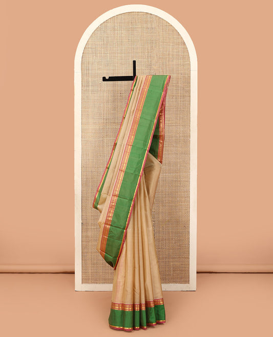 Sandal plain Kanchipuram silk saree, contrast rettai pettu border of rekku, neli, poun, star vanki, and banaras designs, and zari design pallu