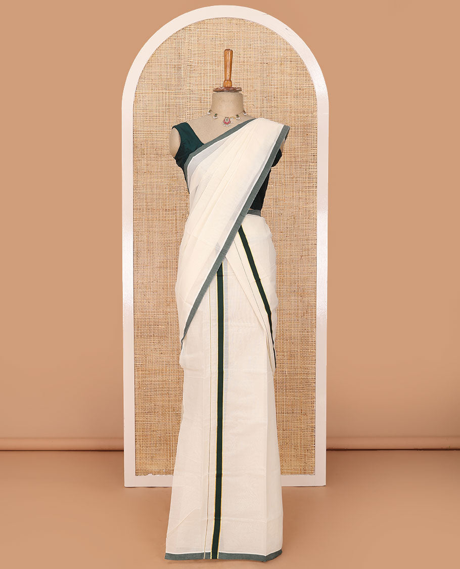 Cream plain Kerala mundu set with contrast deep forest green border