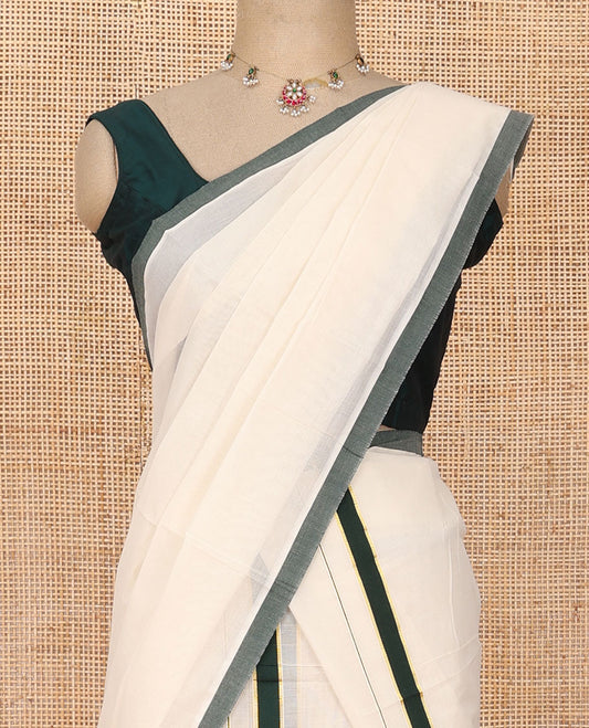 Cream plain Kerala mundu set with contrast deep forest green border