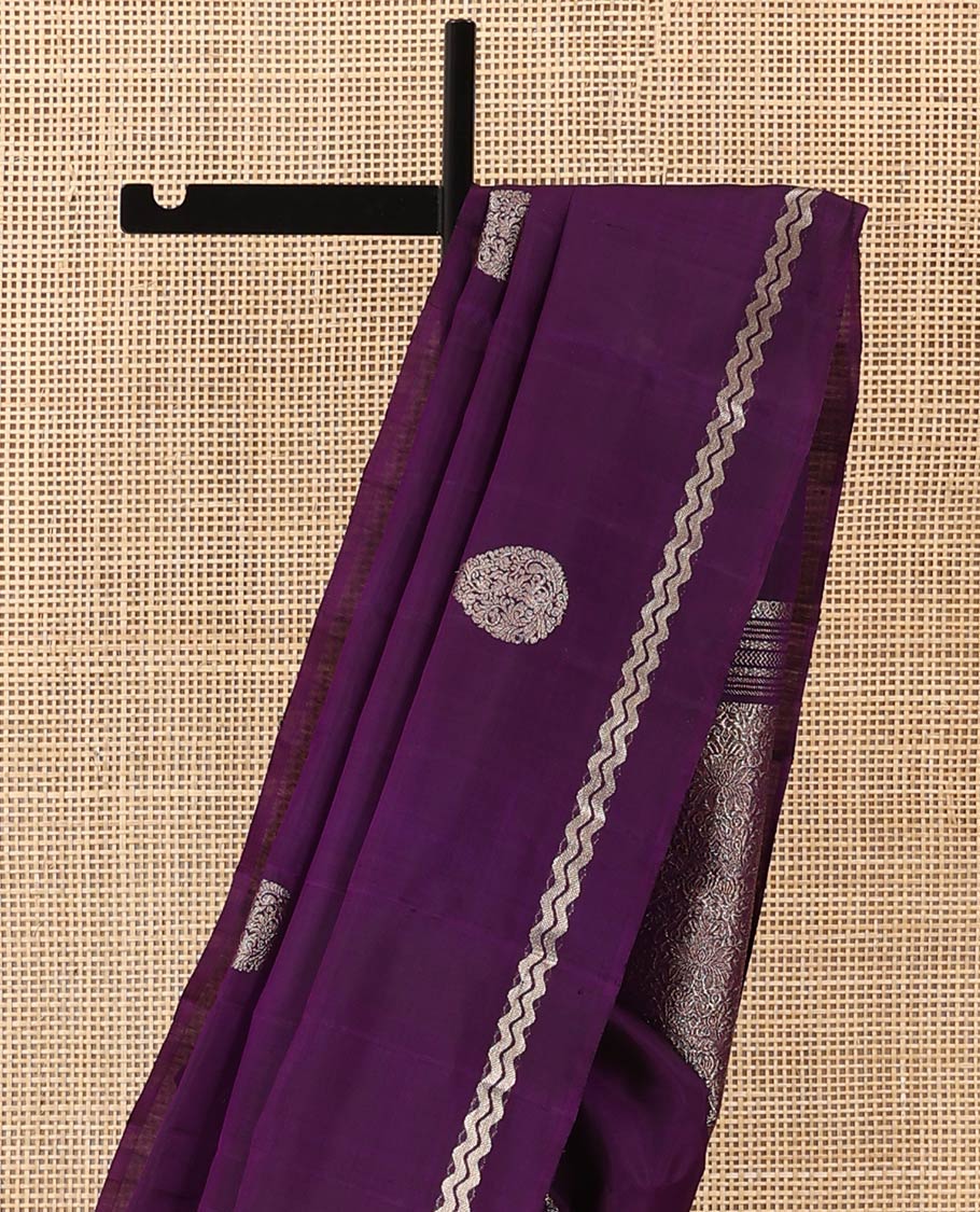 Purple thilakam zari buttas woven soft silk saree, zig-zag stripes border, and floral jaal pallu
