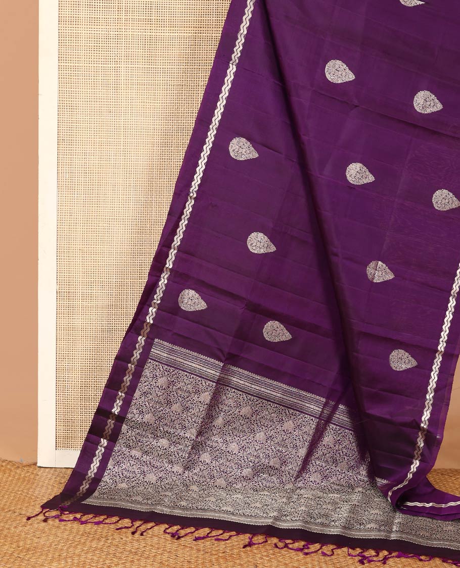 Purple thilakam zari buttas woven soft silk saree, zig-zag stripes border, and floral jaal pallu