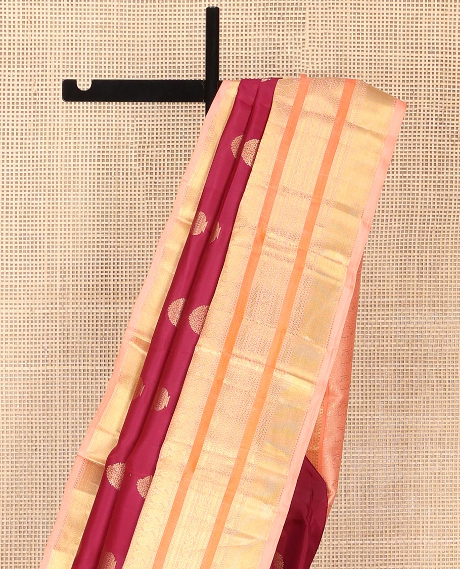 Maroon Vasundhara Silk Saree, Detailed with Floral Zari Buttas All Over Its Body, Complemented by a Contrast Border of Salngai, Mayil, Rettai Neli, and Kodi Visiry Designs, Pallu Steeped with Kodi Visiry Designs, and Paired with a Contrast Blouse