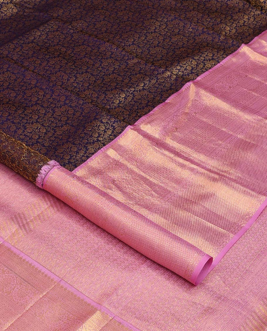 Blue floral jaal jacquard wedding silk saree, zari border of thilakam, neli, kodi visiry, and mayil kann, and intricate pallu