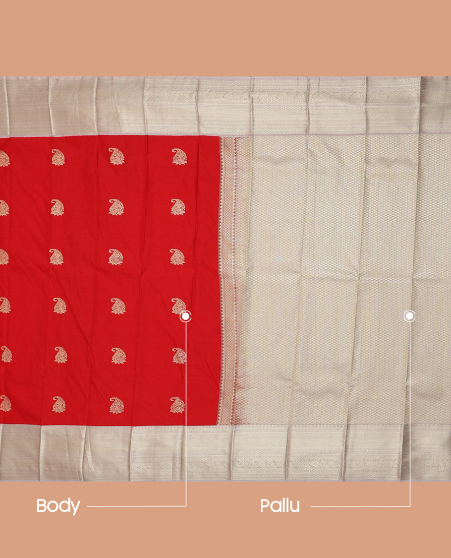 Red Budget Silk Saree Enthralled with Paisley Zari Buttas, Complemented by a Contrast Border Steeped with Traditional Zari Designs, Subtly Designed Jaal Pallu, and Paired with a Contrast Blouse