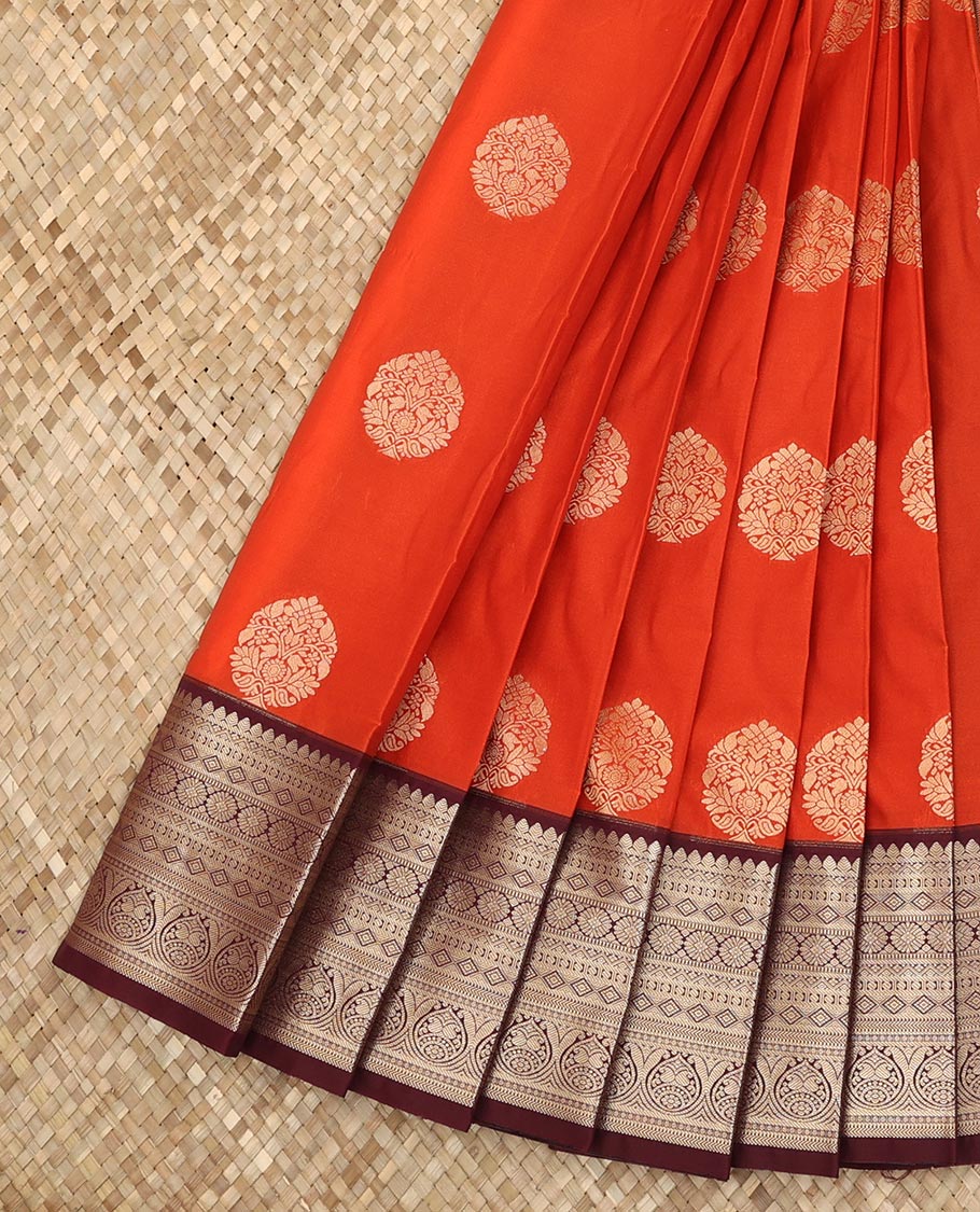 Rust orange zari buttas budget silk saree, contrast traditional zari temple border, and intricate pallu