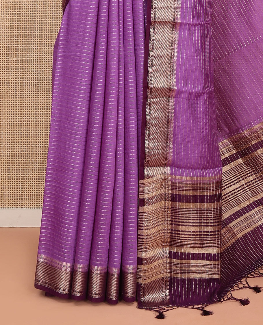 Purple Assam Silk Saree Delicately Woven with Zari Stripes, Complemented by Captivating Contrast Traditional Zari Border, Scintillating Zari Striped Pallu, and Paired with a Contrast Blouse