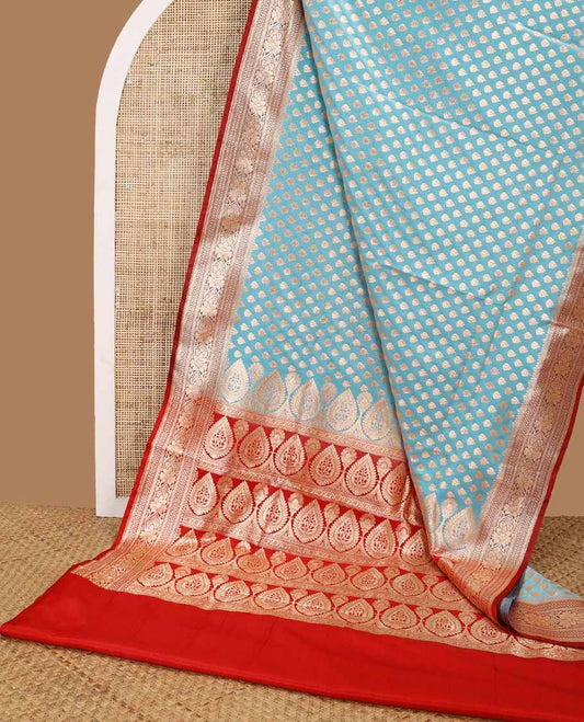 Sky blue buttas semi banaras nylon saree with contrast border of intricate zari designs & jaal design pallu