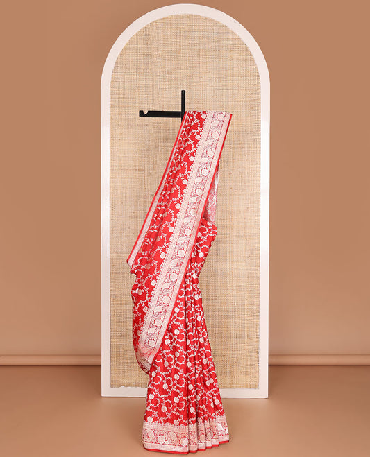 Red floral jacquard banarasi silk saree, self-border of floral & leaf creeper designs & intricately woven pallu of  floral & paisley designs