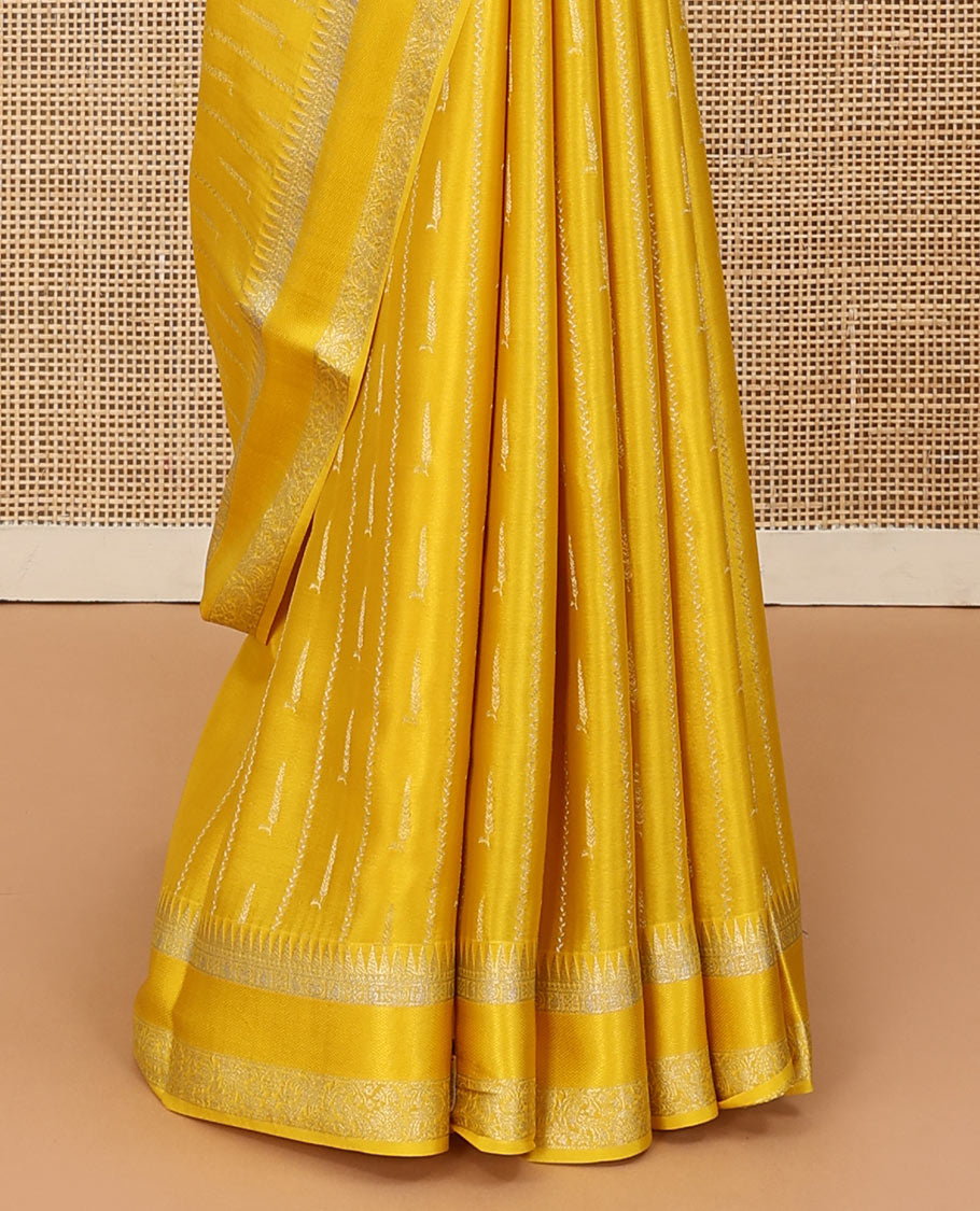 Sandal zari buttas and zig-zag striped crepe saree, traditional zari border, and pallu of traditional design weave