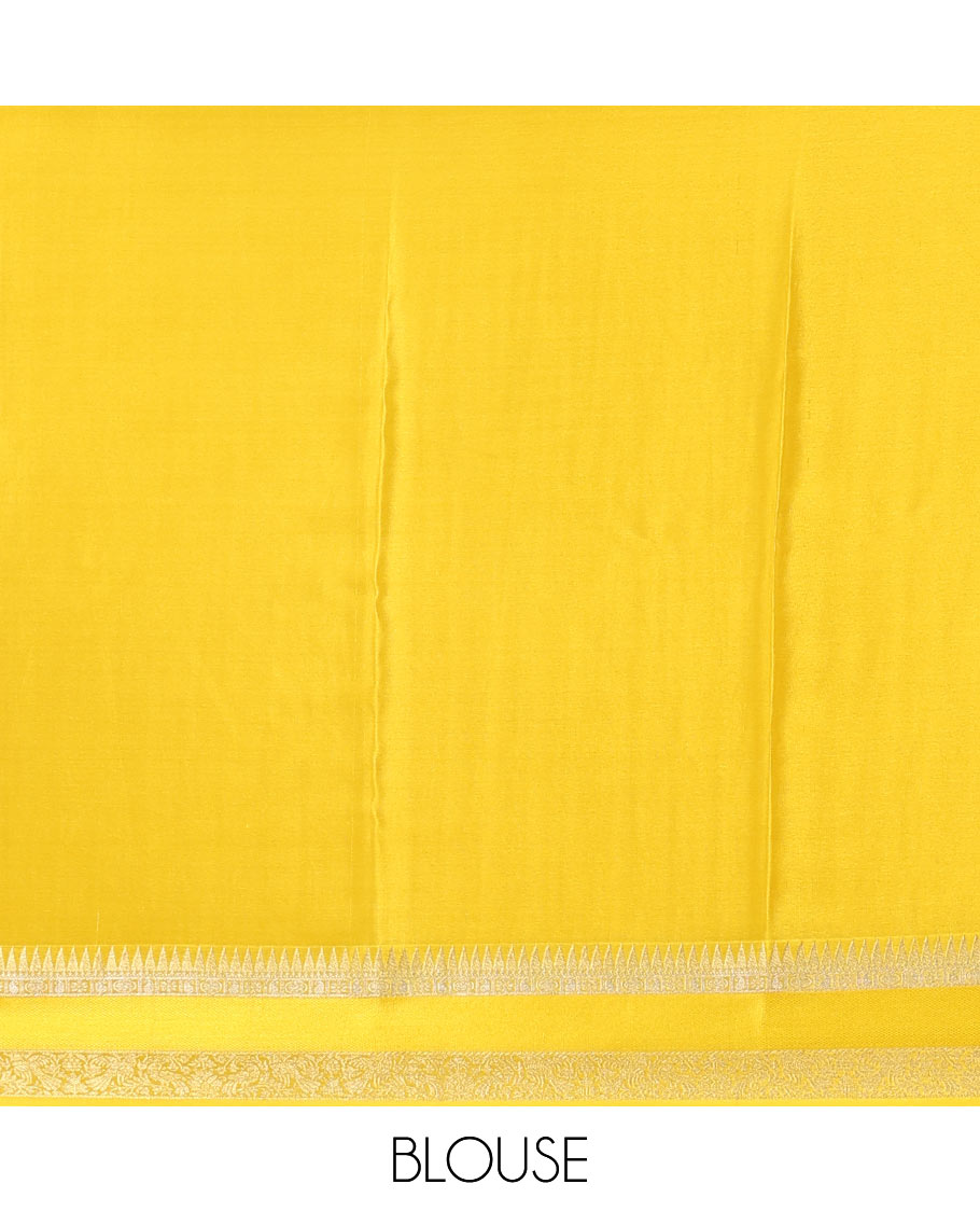 Sandal zari buttas and zig-zag striped crepe saree, traditional zari border, and pallu of traditional design weave