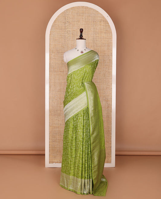 Parrot green geometric zari design fancy crepe saree, traditional zari border & intricate pallu