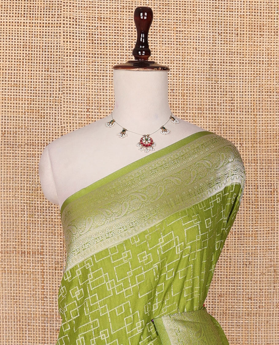 Parrot green geometric zari design fancy crepe saree, traditional zari border & intricate pallu