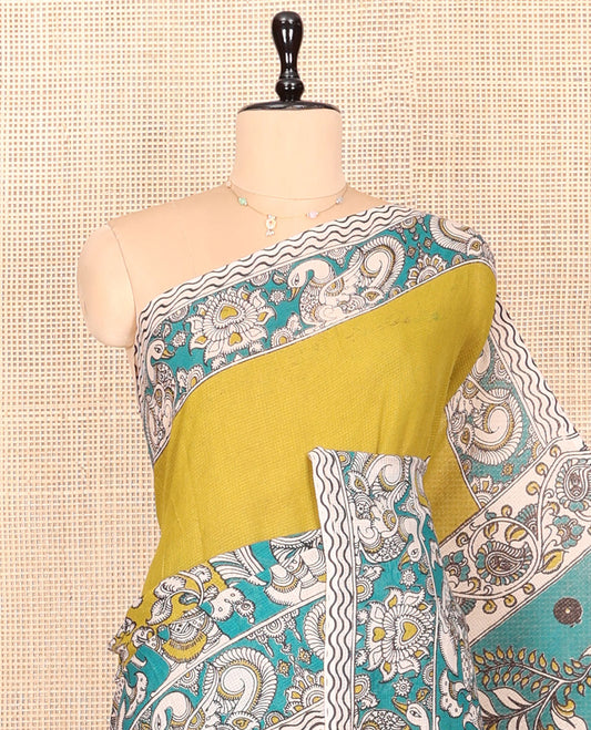 Green Kalamkari Cotton Saree, Elevated with Flora-Fauna Print, Contrast Kalamkari Printed Border, Peacock Kalamkari Pallu, and a Contrast Blouse