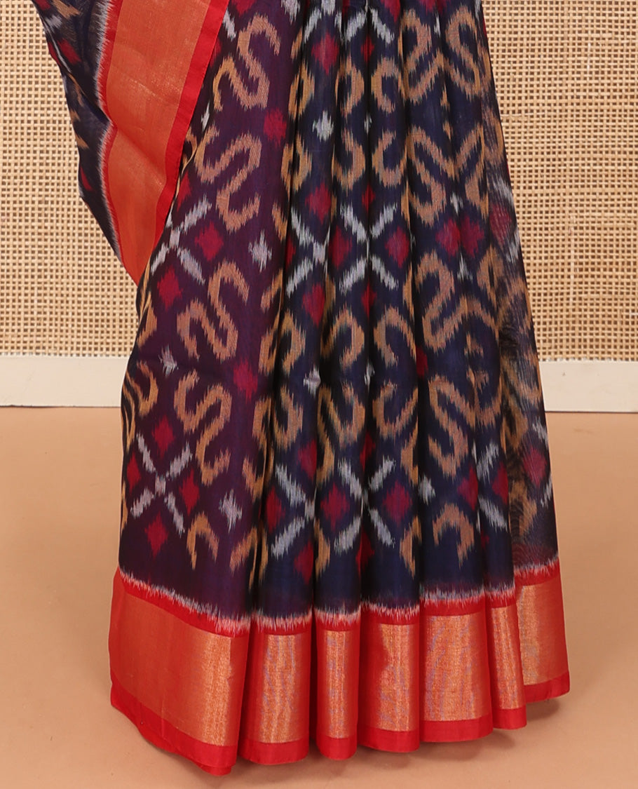 Blue Pochampally Ikkat-style designed silk cotton saree, contrast bavanji border, and ikkat design pallu