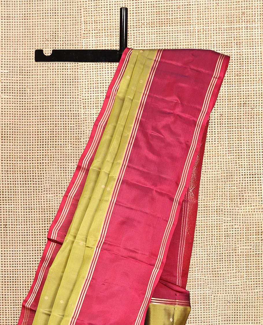 Green Vasundhara Lite-Silk Mix Saree, Beautifully Decorated with Zari Buttas All Over Its Body, Complemented by Contrast Rettai Pettu Border of Zari Stripes, Pallu Accentuated with Jaal Designs, and Paired with a Contrast Blouse