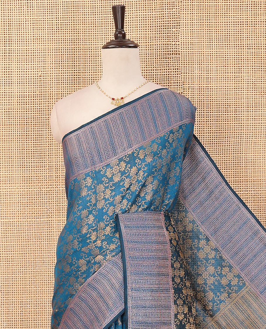 Blue floral jacquard art dupion saree, zari border, and pallu steeped with geometric patterns