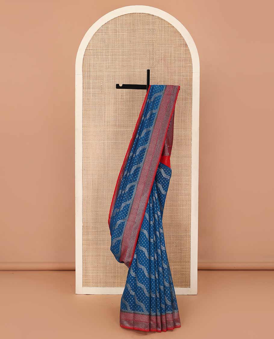 Blue diagonal zig-zag floral vine woven fancy saree, contrast zari border, and zari woven pallu
