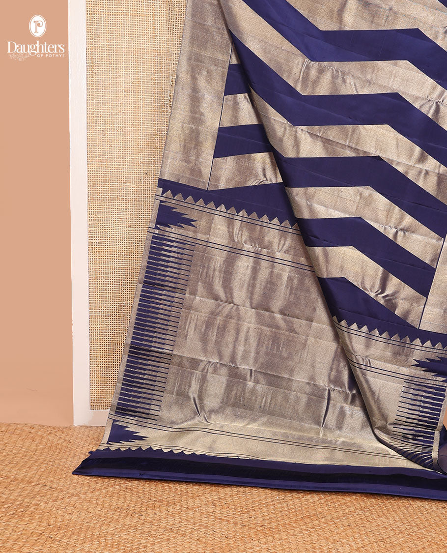 Blue thick zig-zag striped kancheepuram silksaree, getti zari border & zari-rich pallu of pillaiyar mokku & seeppu rekku