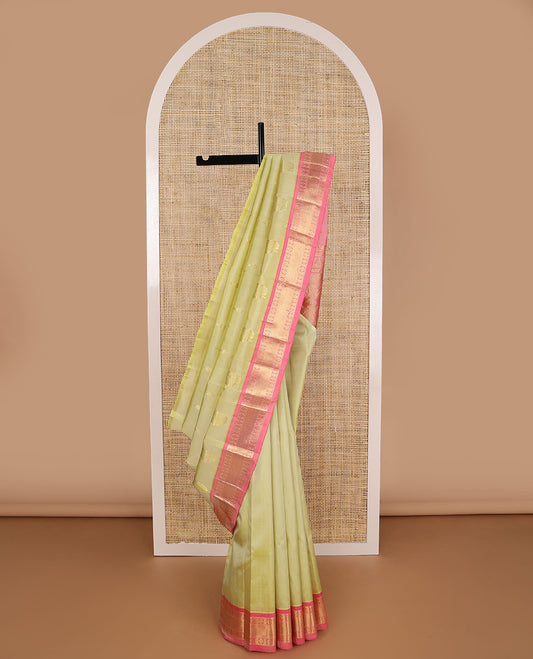 MInt green flower buttas kancheepuram silk saree with contrast poo chakram, mayil kann design & zari design pallu