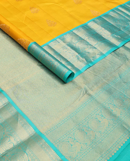 Yellow zari buttas silk saree, contrast border of salangai,neli,lavangam,mayil kann & dhavana kodi & jaal pallu