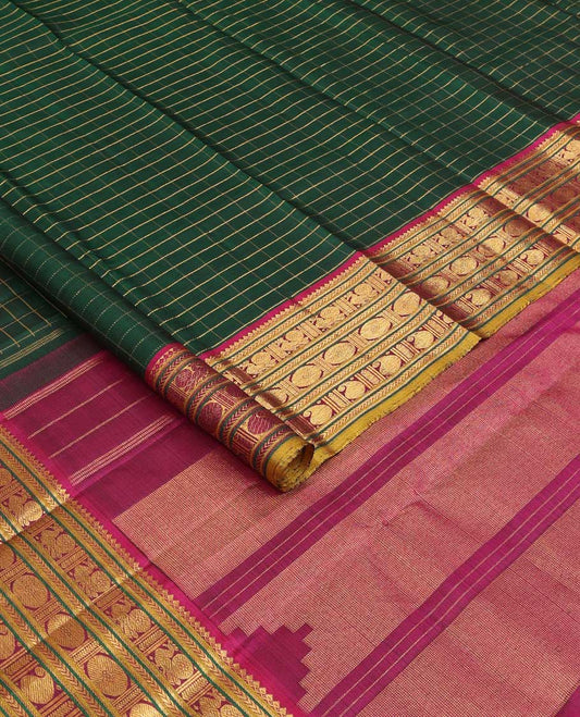 Green zari checked Kanchipuram silk saree, contrast border of thilakam mokku,kathir, and mayil chakram designs, and thazampoo rekku pallu