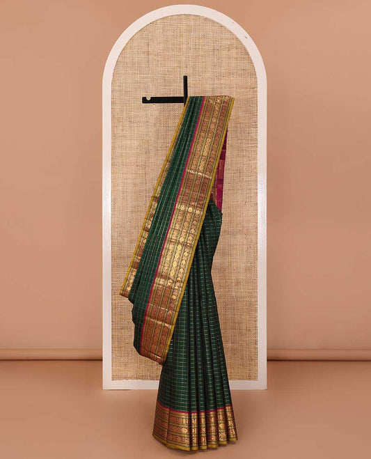 Green zari checked Kanchipuram silk saree, contrast border of thilakam mokku,kathir, and mayil chakram designs, and thazampoo rekku pallu