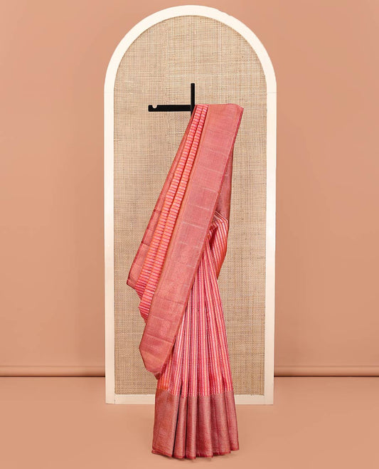 Red Kanchipuram Designer Silk Saree, Boldly Accentuated with Jacquard Design All Over Its Body, Gleaming Zari Striped Border, Pallu Steeped with Zari Stripes, and Paired with a Matching Blouse