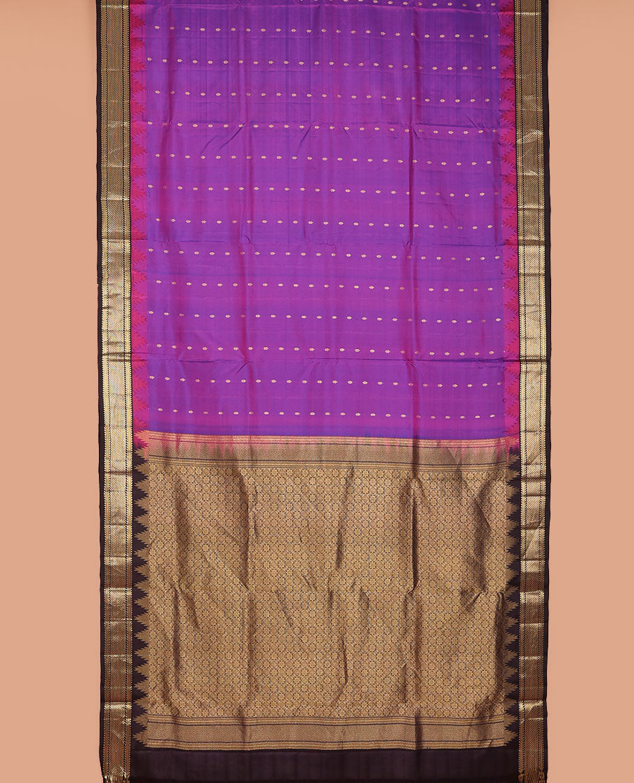 Purple nine-yard silksaree with zari buttas,contrast thazampoo reku border of ara bogudi,muthu & ara maadam & jaal pallu