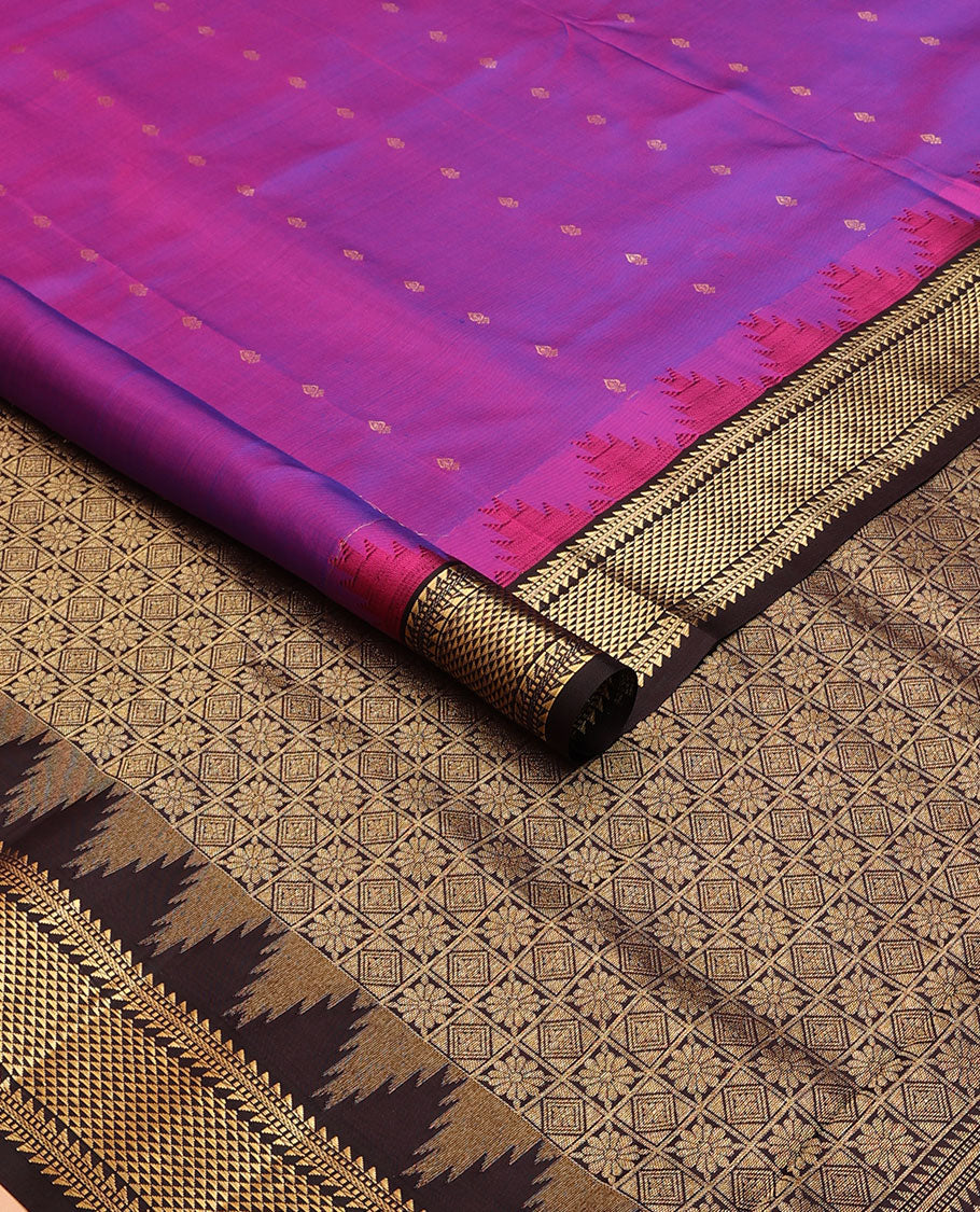 Purple nine-yard silksaree with zari buttas,contrast thazampoo reku border of ara bogudi,muthu & ara maadam & jaal pallu