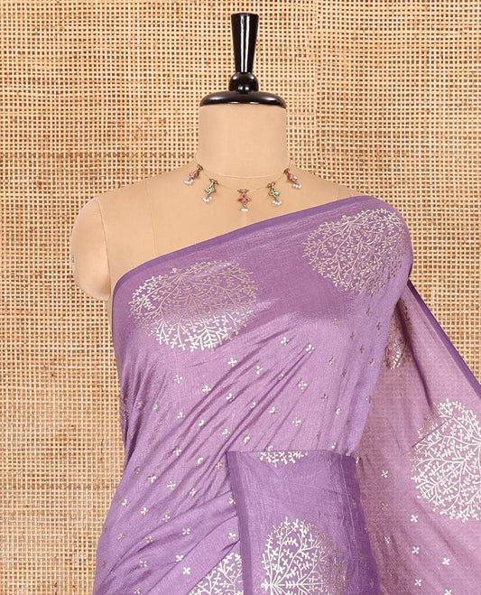 Lavender plus buttas woven Vichitra silk saree, kalpavriksha tree motifs woven on its border, self-pallu, and no blouse