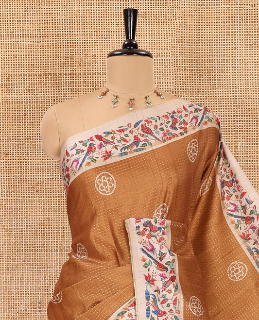 Mustard zari buttas and bandhani dotted fancy tussar saree, contrast floral and bird printed border, striped pallu, and a matching blouse
