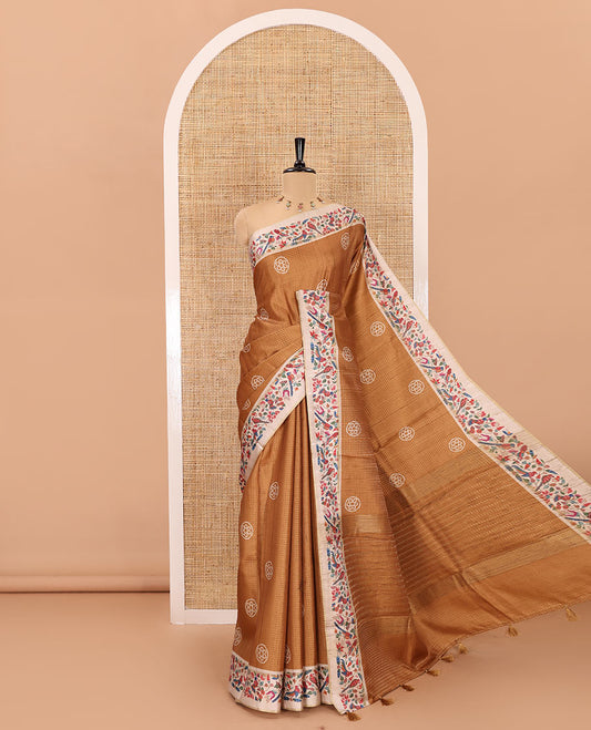 Mustard zari buttas and bandhani dotted fancy tussar saree, contrast floral and bird printed border, striped pallu, and a matching blouse
