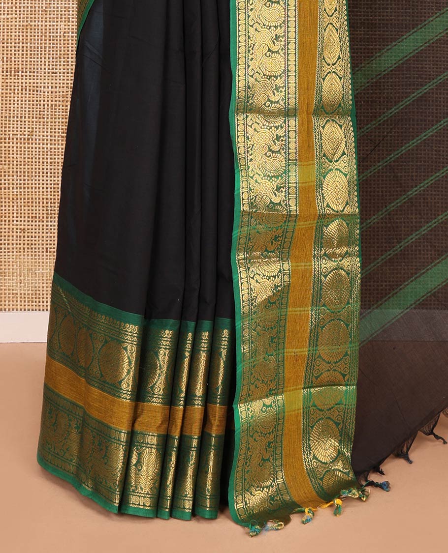 Black plain Chettinad cotton saree, contrast traditional design rettai pettu border of peacock chakram, striped pallu, and a matching blouse