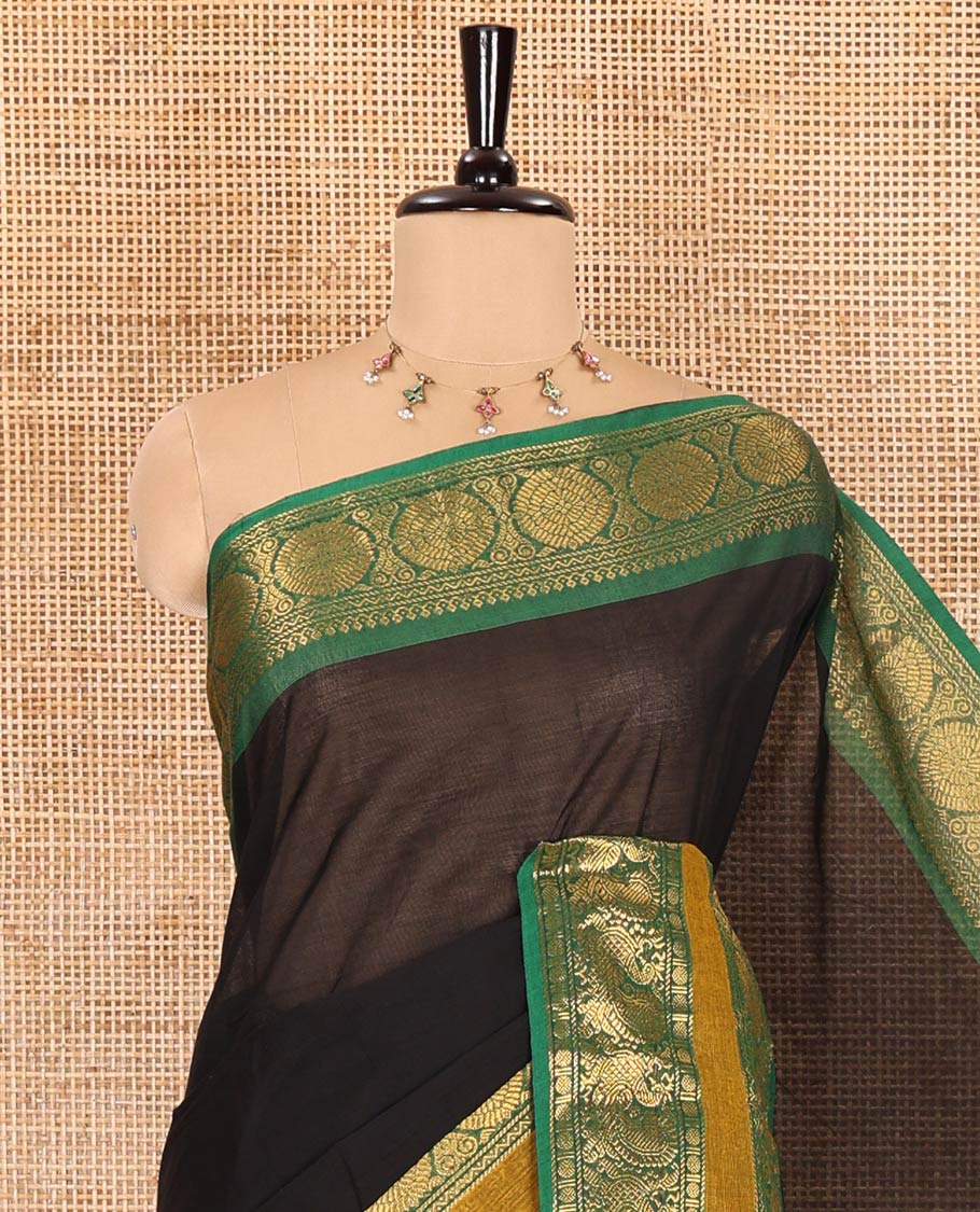 Black plain Chettinad cotton saree, contrast traditional design rettai pettu border of peacock chakram, striped pallu, and a matching blouse