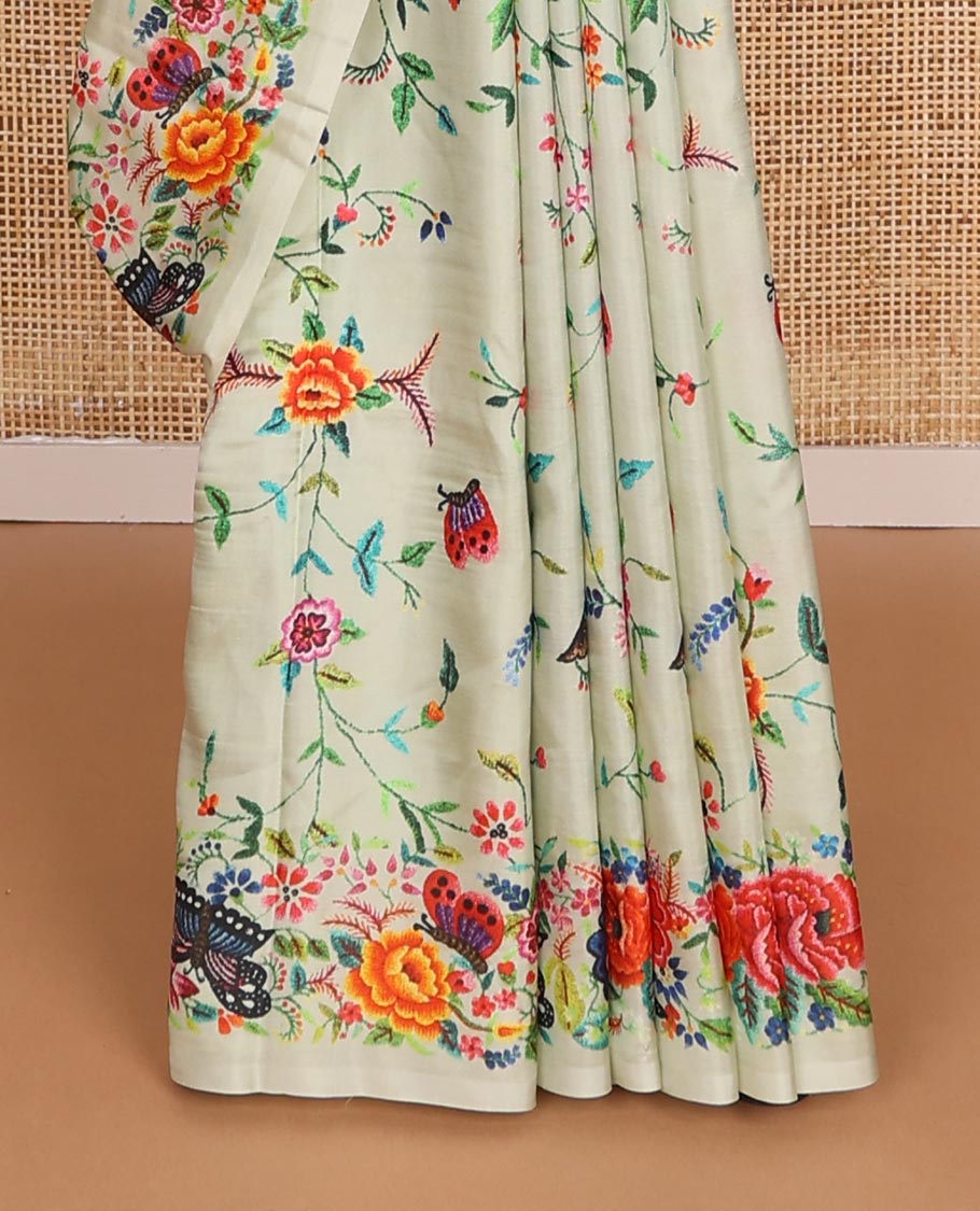 Pastel green floral vine & butterflies printed silk saree, self-border & pallu features the same floral vine & butterflies print