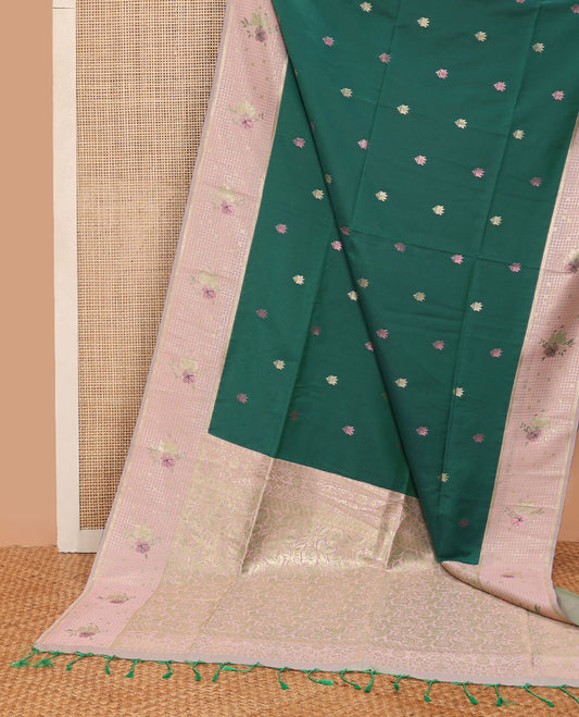 Green semi-soft silk saree with zari buttas, contrast zari check border of floral design & thick zari woven floral designs