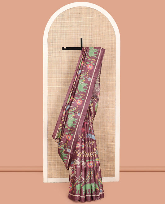 Brown Tussar Silk Saree, Artfully Detailed with Flora, Fauna, and Human Figurines Print on Its Body, a Subtle Border, Pallu Mirrors the Same Print, and Paired with a Matching Blouse