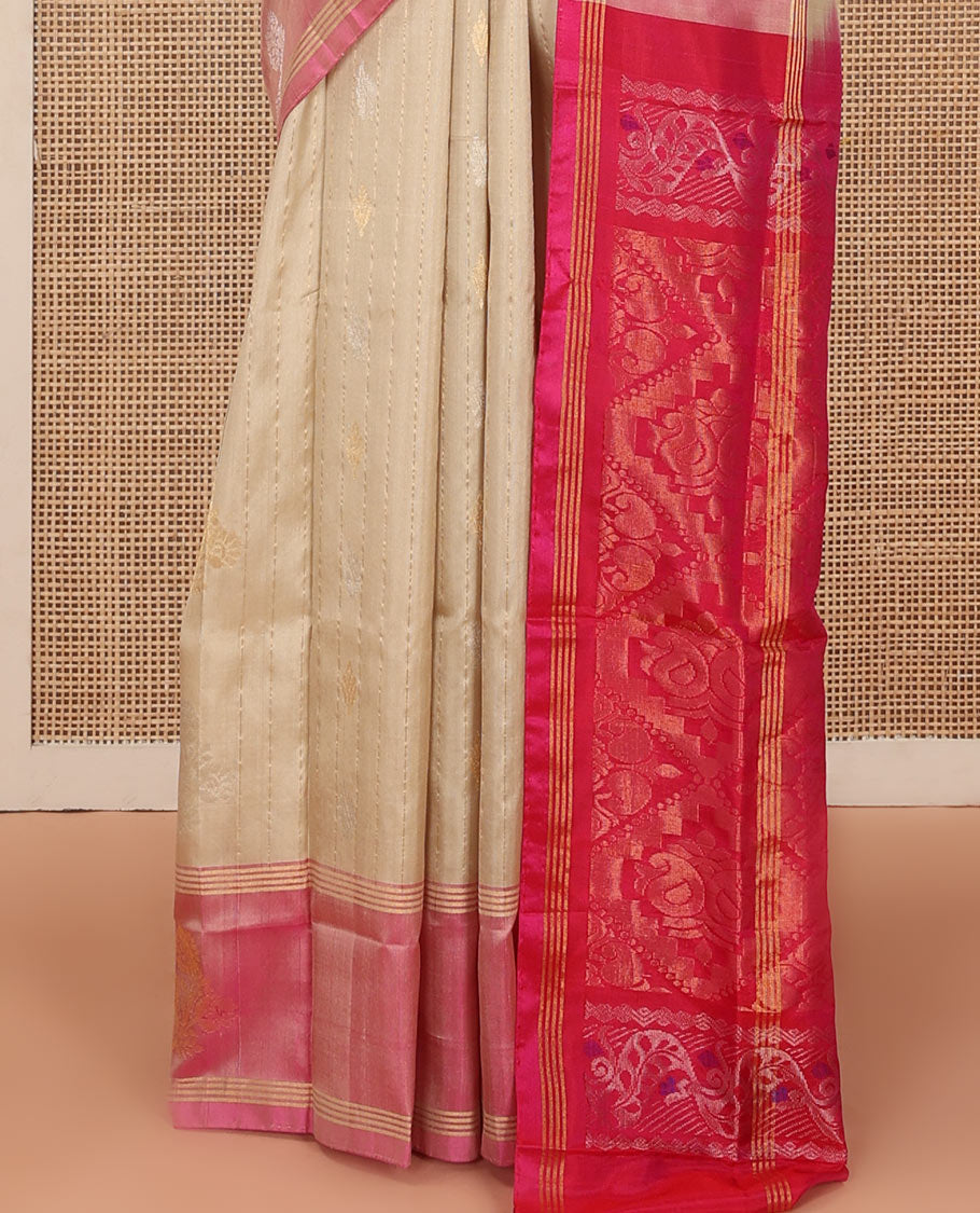 Sandal Uppada Silk Saree Featuring Zari Stripes and Buttas, Complemented by Contrast Sparsely Woven  Border of Zari Floral Motifs, Contrast Pallu Decked Up with Jaal Designs, and Paired with a Contrast Blouse
